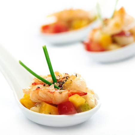 Gebakken scampi met fruit en Franse vinaigrette